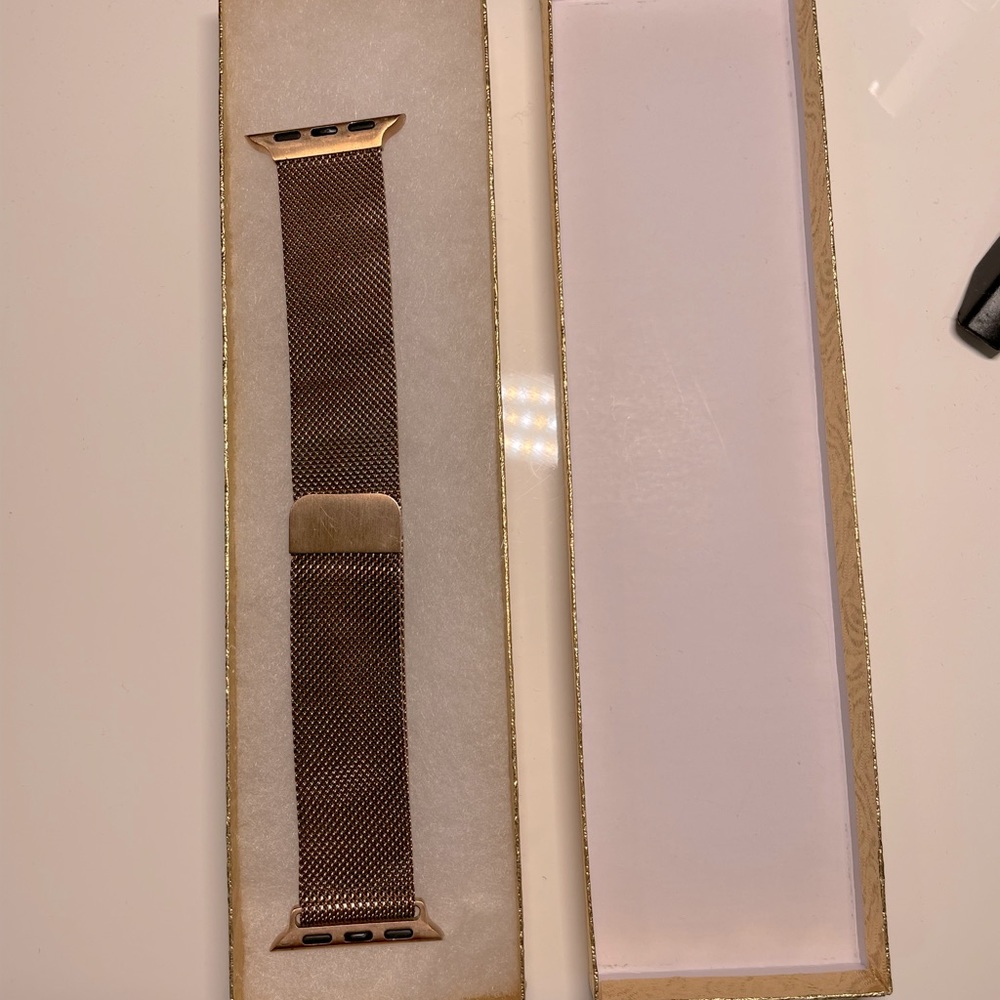 Gold tone mesh Apple Watch band